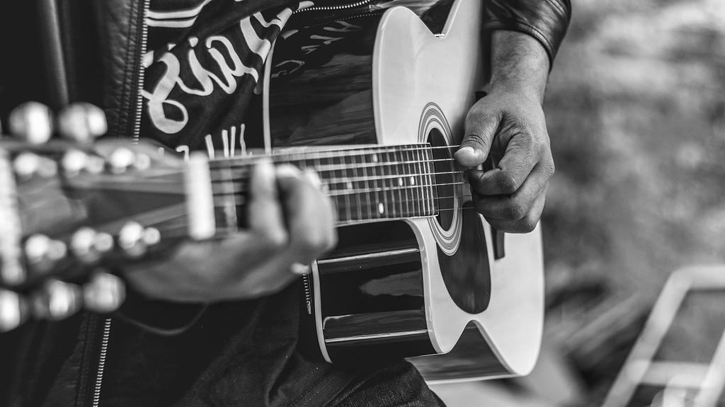 Jazz musicians performing in dimly lit club atmosphere